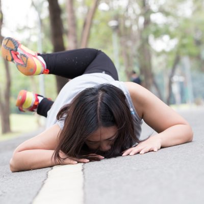 Accident. stumble and fall while jogging in the park