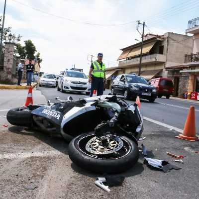Argolida Greece - May 15 2016: traffic accident between a car and a motorcycle large displacement on country roads